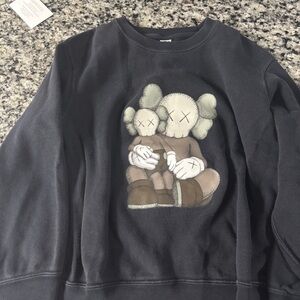 Uniqlo Black Top with Beige Cross Stitch